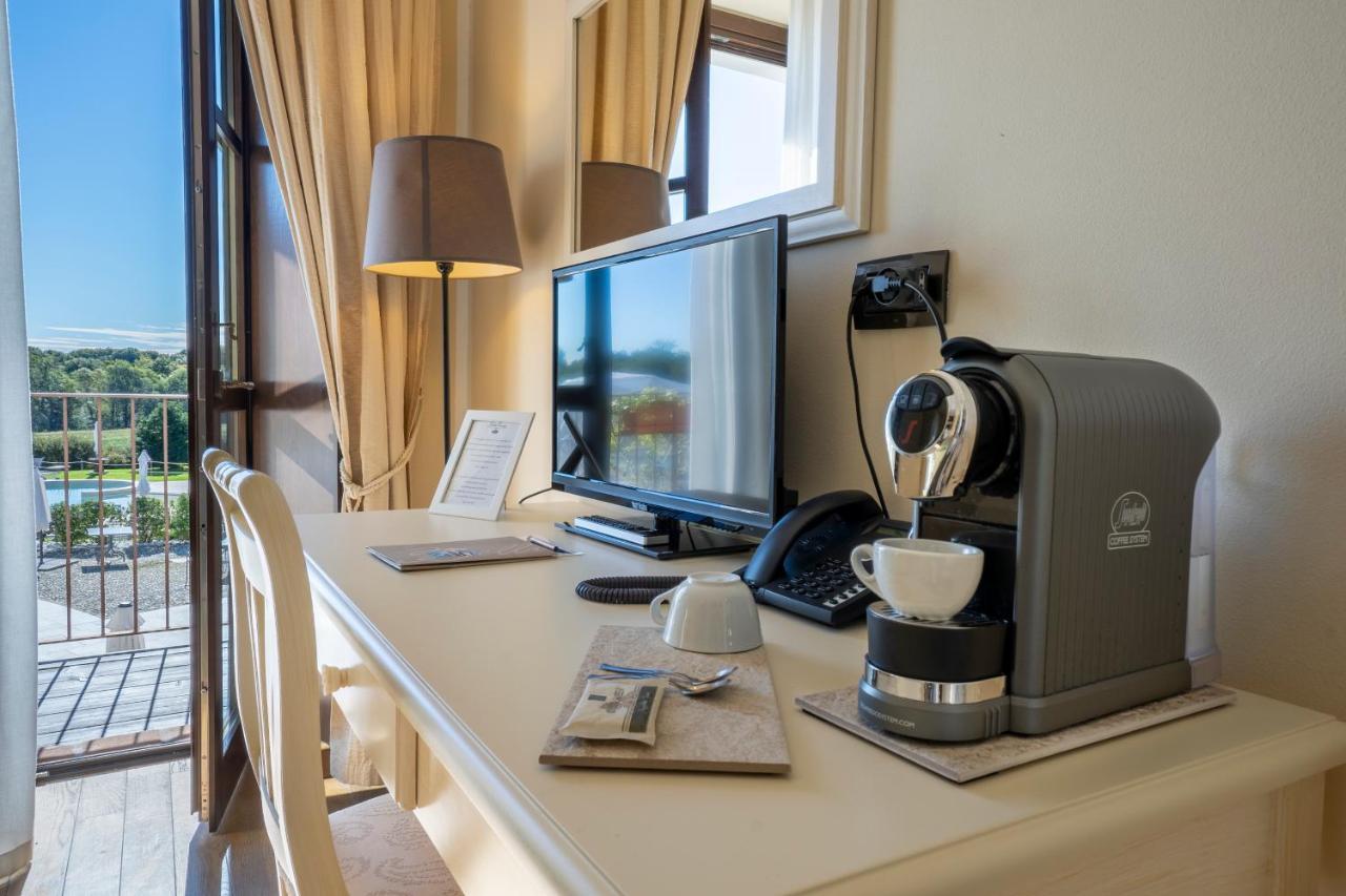 Relais Bella Rosina Pool & Spa La Cassa ภายนอก รูปภาพ